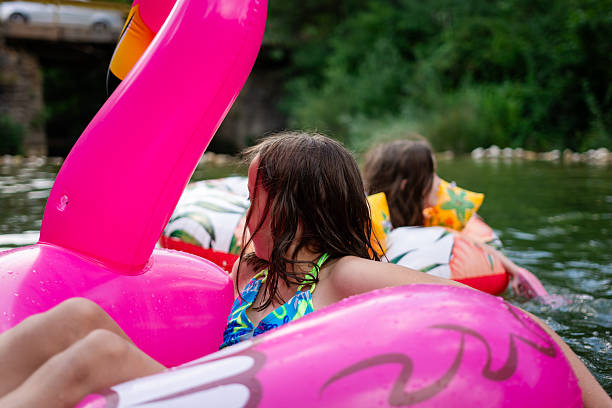 istock Children floats on a inflatable tube on the river 2233497787