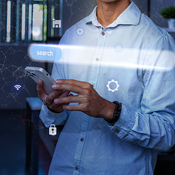 istock Person using smartphone in modern workspace while engaging with technology and online search functions 2233500501
