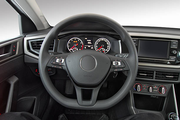 istock Steering wheel in the new car 2233502405