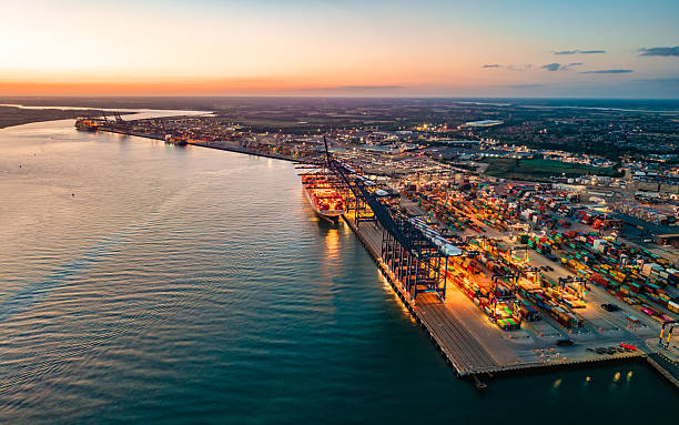 istock Container ship being loaded at felixstowe port at sunset 2233504417
