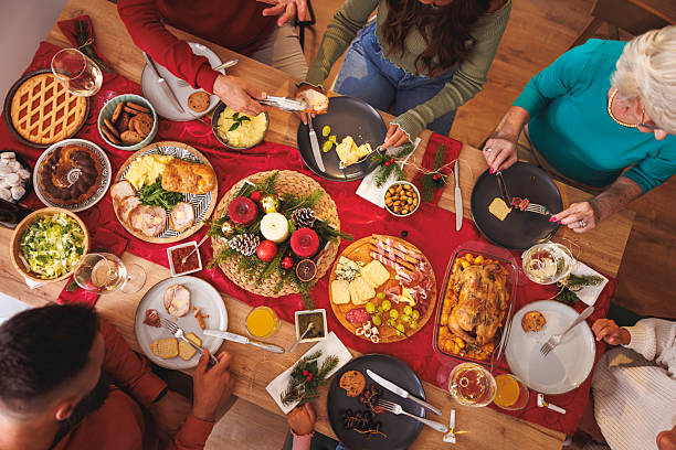 istock Family having Christmas dinner at home 2233504852