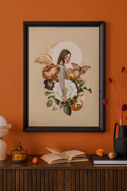istock Eclectic sideboard styling with modern graphics mock up and organic accents. Warm hues dominate this cozy vignette interior. 2233506524