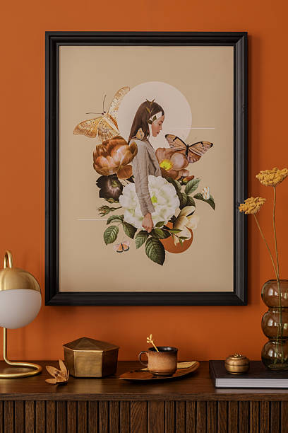 istock Close-up of eclectic interior styling with mock up artwork, brass lamp and ceramic accessories in a warm-toned setting. 2233506563