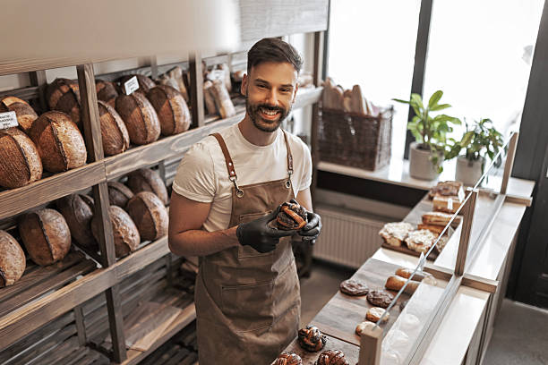 istock Portrait of attractive man in bakery workplace 2233506932