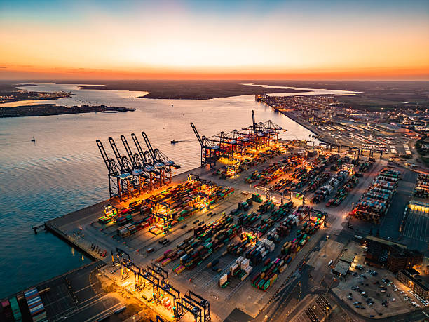 istock Container ship being loaded at felixstowe port at sunset 2233508753