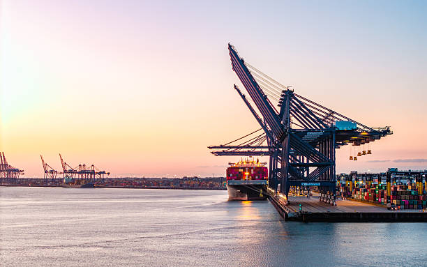 istock Container ship docking at felixstowe port during sunset 2233508764