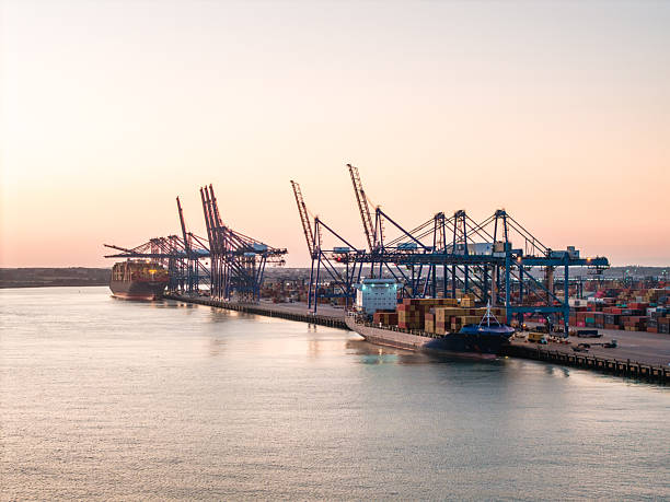 istock Container ship docking at felixstowe port during sunset 2233508876