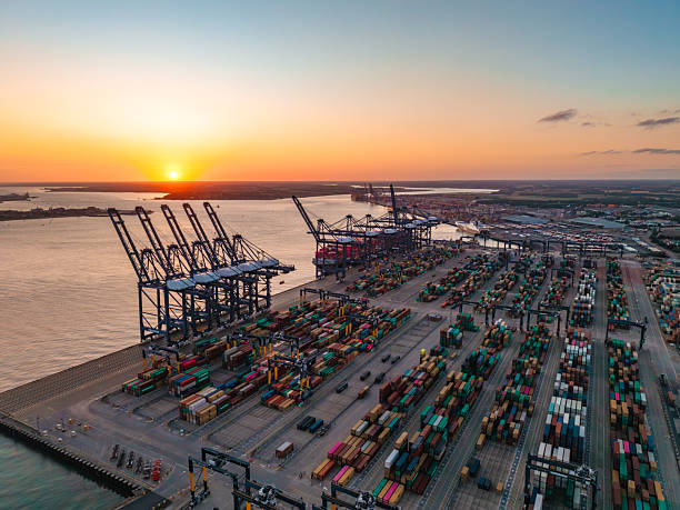 istock Container ship docking at felixstowe port during sunset 2233509781