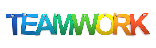 istock Teamwork concept. Colorful letters pinned on white wall. 2233512495