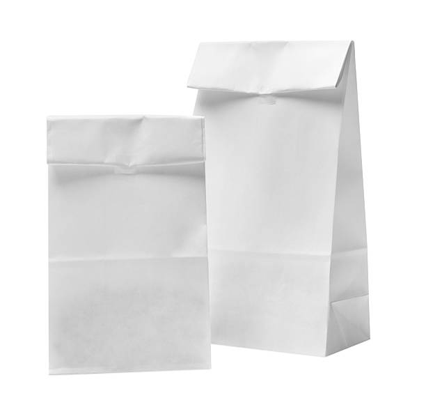 istock Two closed paper bags isolated on white 2233520572