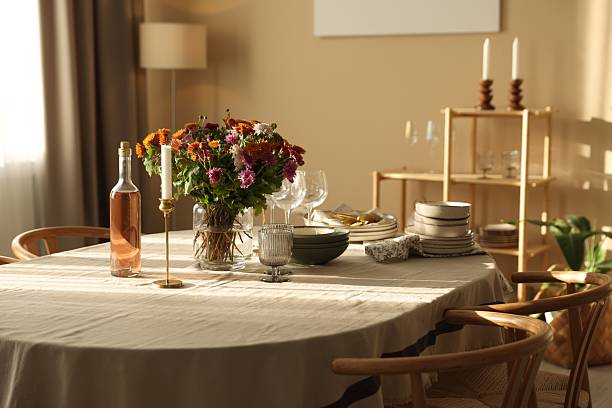istock Stylish table setting with dishware, glasses and beautiful flowers indoors 2233521359