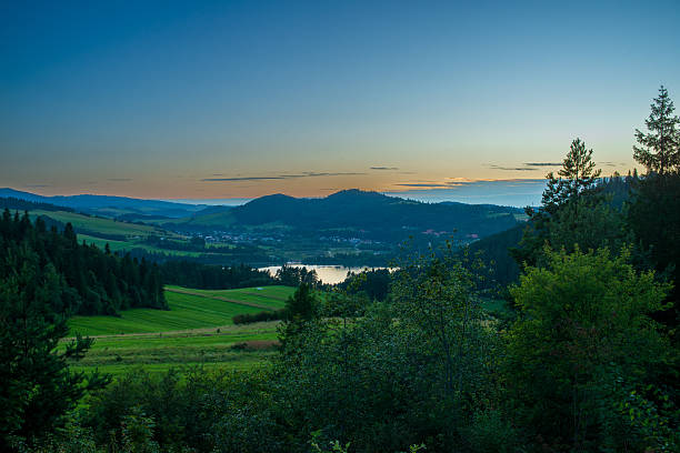 istock Czorsztyn Lake valley at evening glow 2233521379