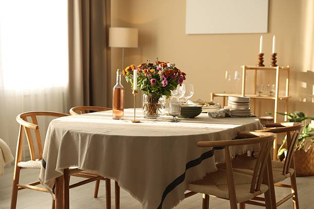 istock Stylish table setting with dishware, glasses and beautiful flowers indoors 2233521514