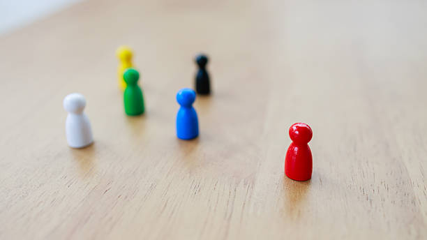 istock Leadership and diversity concept symbolized by a red pawn leading colorful pawns, representing guidance, collaboration, and management of diverse teams to achieve shared goals 2233523442