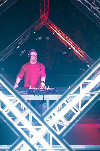istock Dj playing techno music on the futuristic stage 2233526548