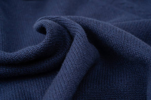 istock Navy blue merino wool sweater texture as background. Top view. 2233528104