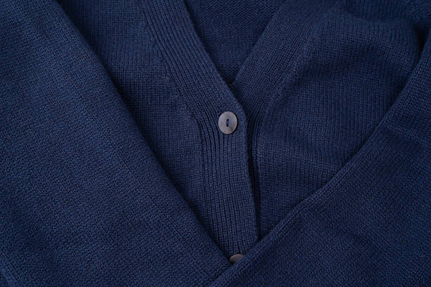 istock Navy blue merino wool sweater texture as background. Top view. 2233528110
