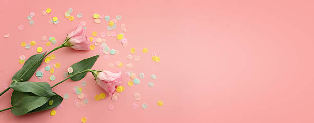 istock Top view image of pink flowers composition over pastel background .Flat lay 2233529304