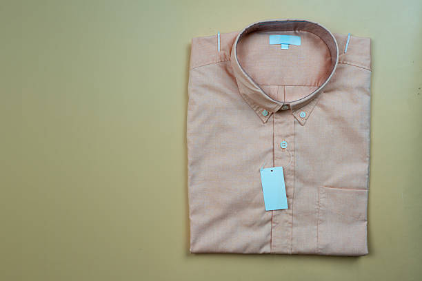 A new of men classic folded pink dress shirt