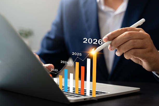 istock New Year 2026, Businessman using laptop to create new business plan for 2026. Strategy include setting goal,Development organizational direction,Objective,Target new opportunities for future growth. 2233539120