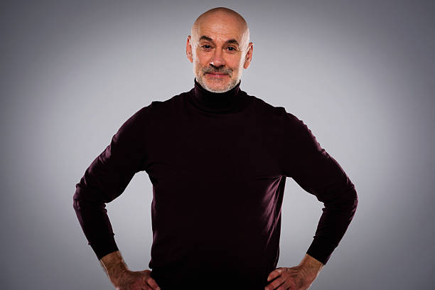 istock Studio portrait of a senior man standing against isolated background 2233539370