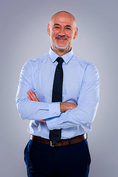 istock Senior man portrait against isolated background 2233539458