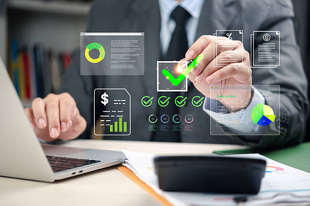 istock Businessman analyzing financial data with digital checklist and charts, representing finance management, business strategy, investment planning, accounting, and corporate success. 2233540887