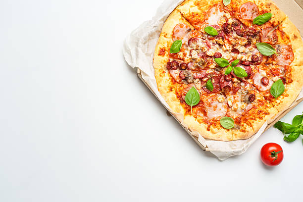 istock Pizza Margarita in a cardboard box on white background. 2233544068