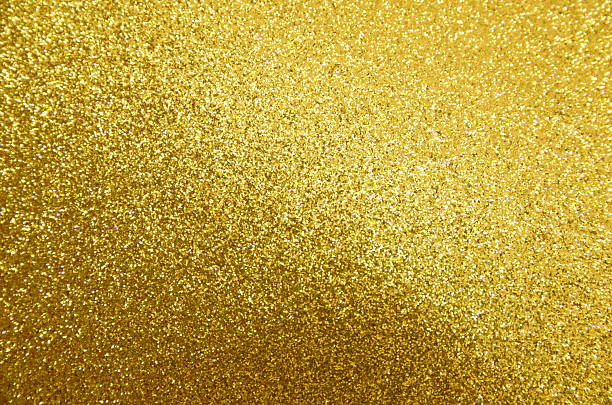 istock Dazzling Golden Glitter Texture Background 2233544179