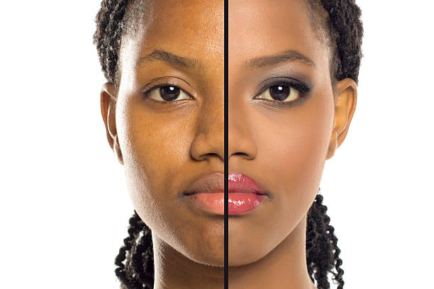 istock Studio shot showing comparison of same black woman before and after makeup on white background. 2233544222