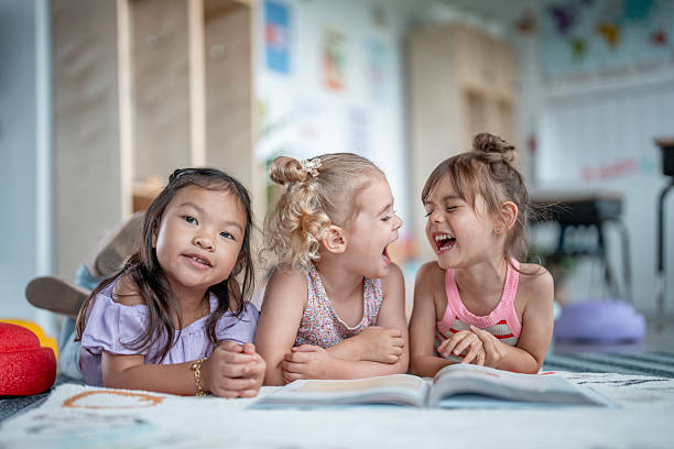 istock Diverse Group of Children Enjoying Time Together in a Bright Classroom Setting 2233544431