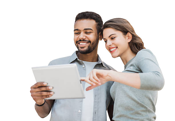 istock Happy couple using digital tablet, isolated on white background 2233545635
