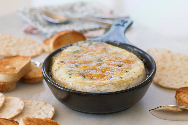 istock Spinach & Artichoke Baked Brie 2233547328