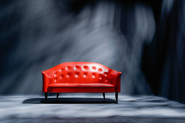 Big Red sofa isolated on a White Background and copy space. 3D rendered image.