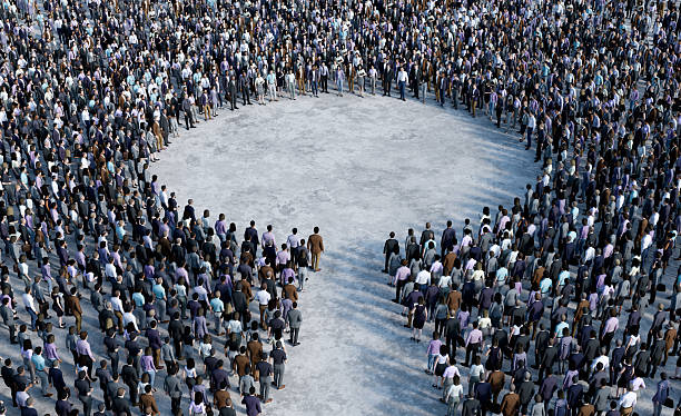 istock Large crowd of people forming way to circle in open space 2233547615