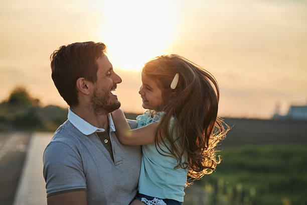 istock Father and daughter enjoying nature 2233548926