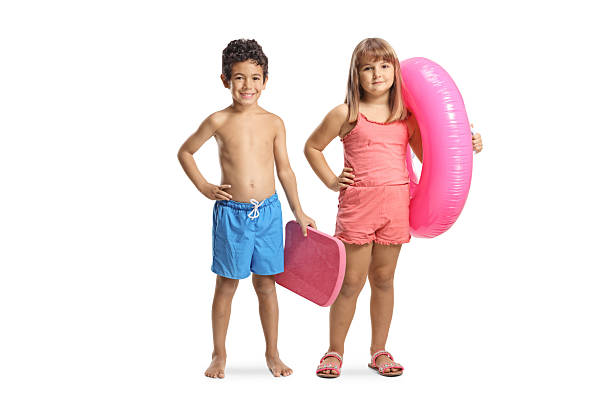 istock Children holding swimming float and swimming ring 2233550189