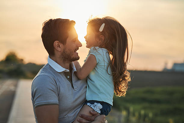 istock Father and daughter enjoying nature 2233550563