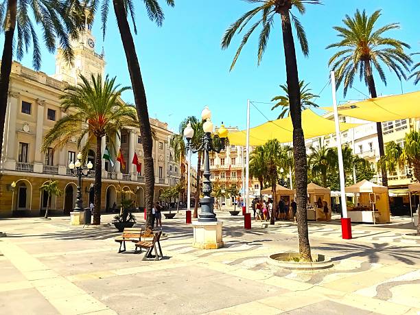 Cádiz ,Spain -August 11 , 2025 .Cadiz, Spain . People walking on the Street.Beautiful streets and architecture, Cadiz.