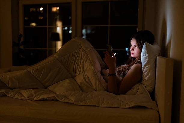 istock Sleep deprivation and mobile phone usage 2233554304