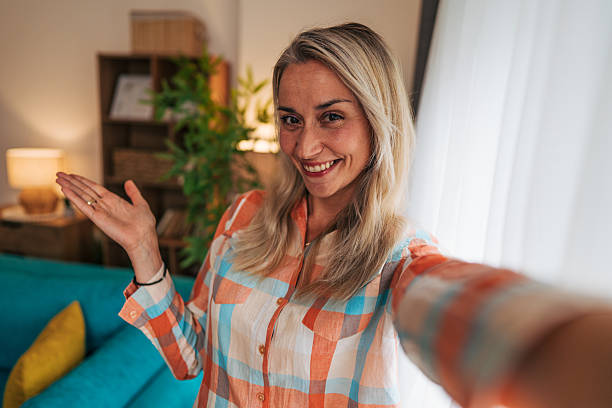 istock Real estate agent showing apartment via video call 2233554500