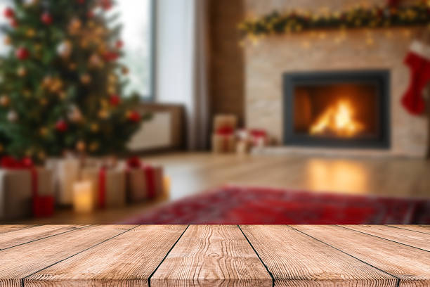 istock Beautiful natural wooden table with christmas background 2233555256