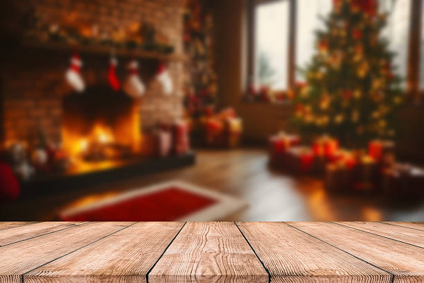 istock Beautiful natural wooden table with christmas background 2233555276