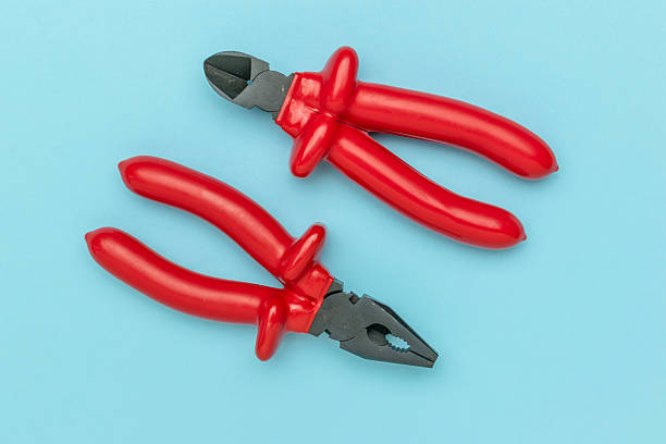 istock Creative Image of Tools Wrapped in Red Balloon Artistry on Soft Blue Background 2233556059