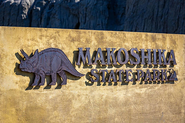 Glendive, MT, USA - July 24, 2025: The entrance sign welcomes visitors to Makoshika State Park, Montana's largest state park, known for its badlands formations and dinosaur fossils