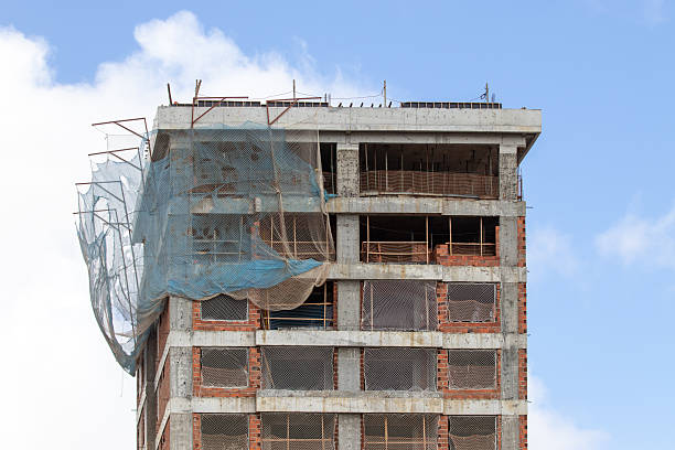 istock High-end residential building under construction with two apartments per floor 2233560999
