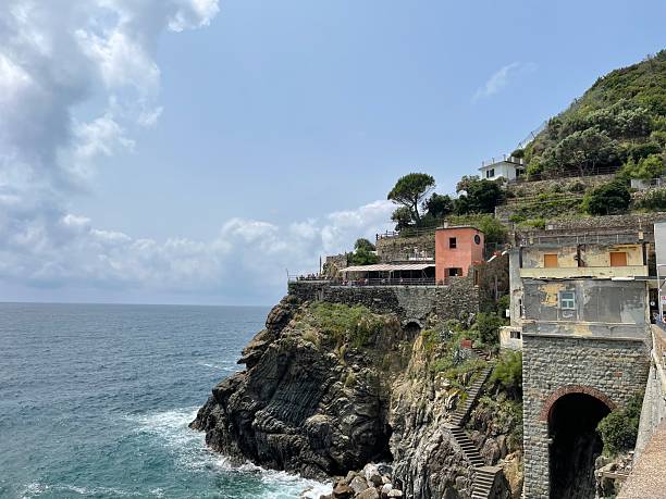 istock Italian architecture on the coast, a sea without boundaries. 2233562805