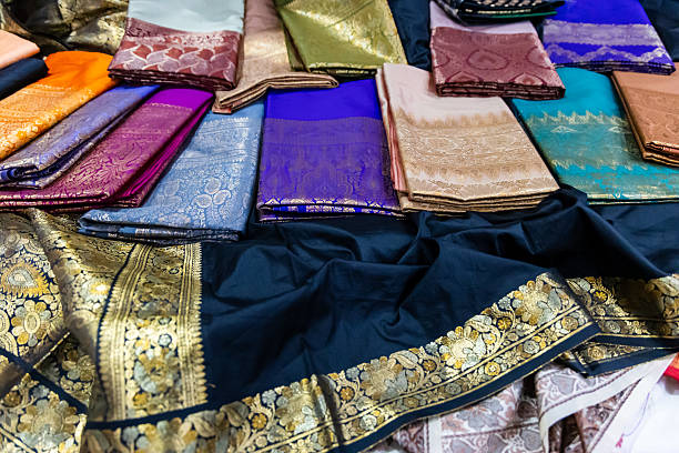 istock authentic traditional varanasi silk saree in different colors for sale at indoor lighting 2233565404
