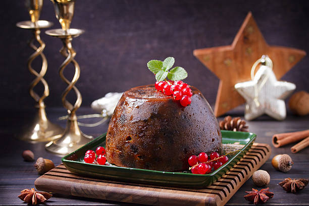 istock Fruit cake pudding traditionally served as part of Christmas dinner 2233574406
