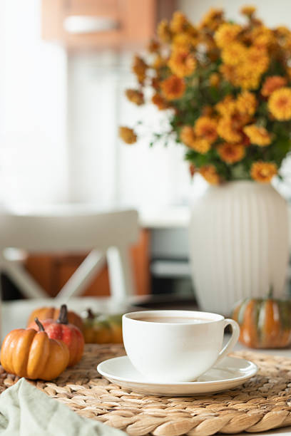 istock Warming autumn tea and candles at modern kitchen. Home interior. Tea time. 2233579657